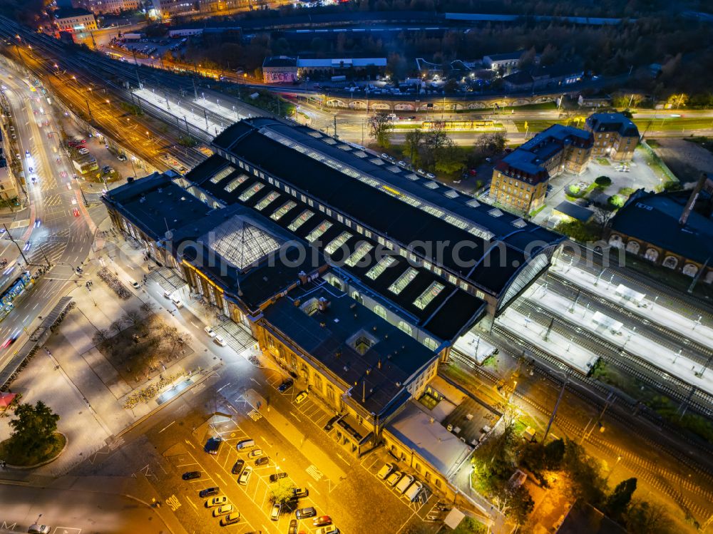 Dresden at night from above - Night lighting station building and track systems of the S-Bahn station Dresden-Neustadt on place Schlesischer Platz in the district Neustadt in Dresden in the state Saxony, Germany