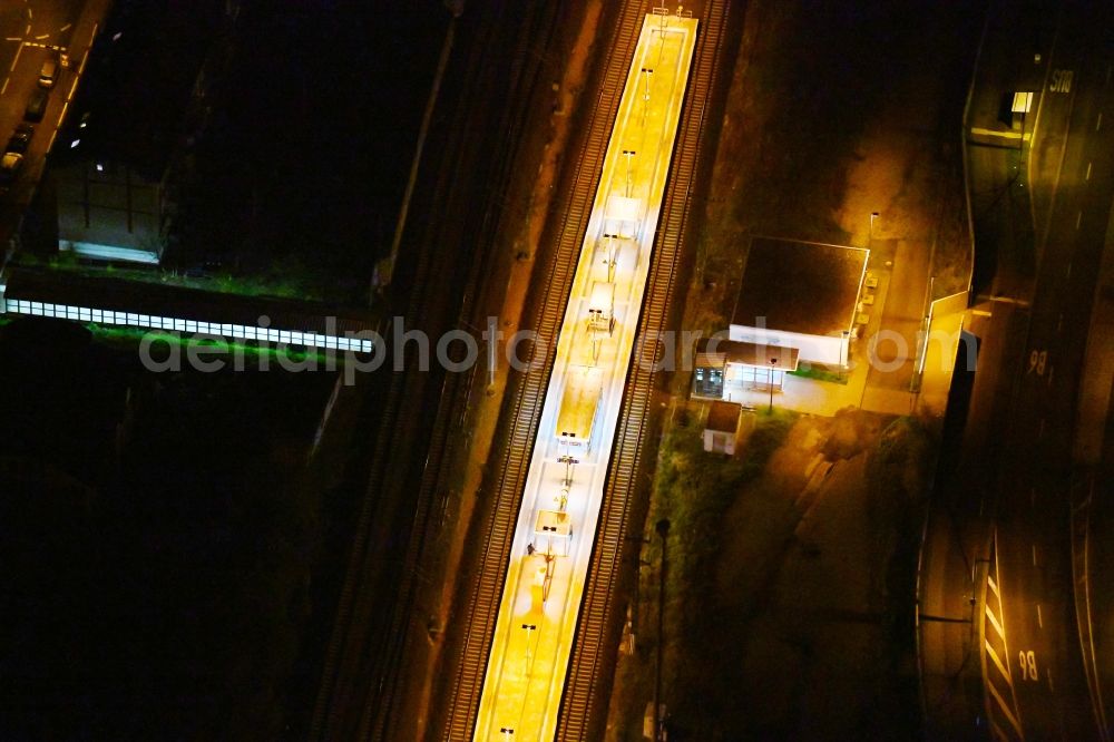 Leipzig at night from above - Night lighting Station building and track systems of the S-Bahn station in the district Wahren in Leipzig in the state Saxony, Germany