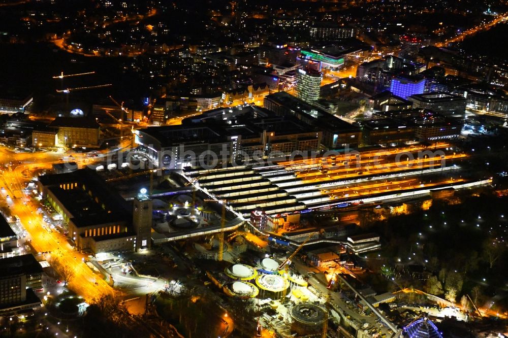 Stuttgart at night from above - Night lighting building of the main station of the railway and construction site for the development project Stuttgart 21 in Stuttgart in the state of Baden-Wurttemberg