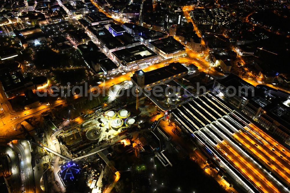 Stuttgart at night from the bird perspective: Night lighting building of the main station of the railway and construction site for the development project Stuttgart 21 in Stuttgart in the state of Baden-Wurttemberg