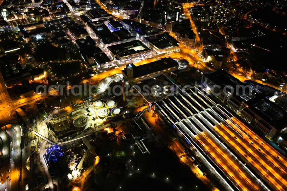 Aerial photograph at night Stuttgart - Night lighting building of the main station of the railway and construction site for the development project Stuttgart 21 in Stuttgart in the state of Baden-Wurttemberg