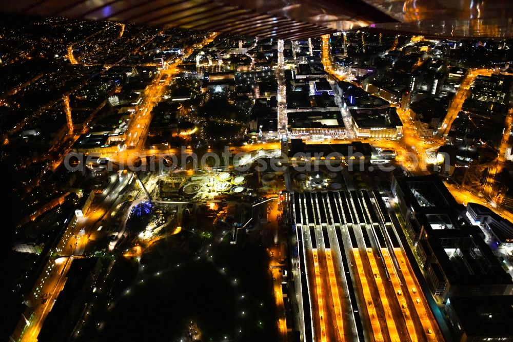 Stuttgart at night from the bird perspective: Night lighting building of the main station of the railway and construction site for the development project Stuttgart 21 in Stuttgart in the state of Baden-Wurttemberg