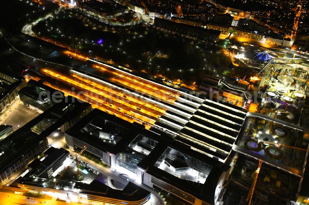 Stuttgart at night from the bird perspective: Night lighting building of the main station of the railway and construction site for the development project Stuttgart 21 in Stuttgart in the state of Baden-Wurttemberg