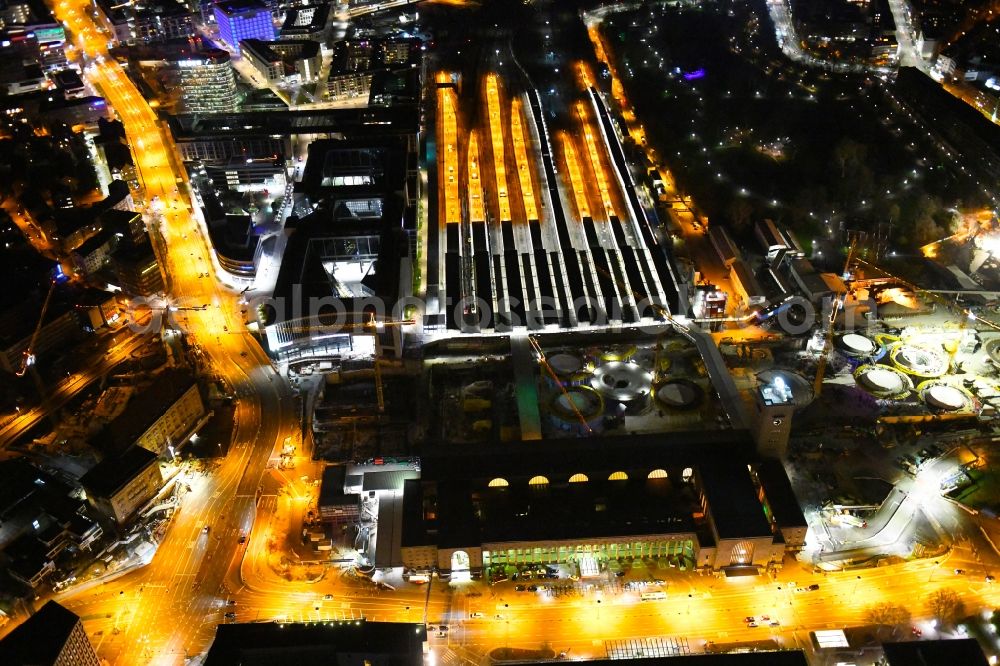 Stuttgart at night from above - Night lighting building of the main station of the railway and construction site for the development project Stuttgart 21 in Stuttgart in the state of Baden-Wurttemberg