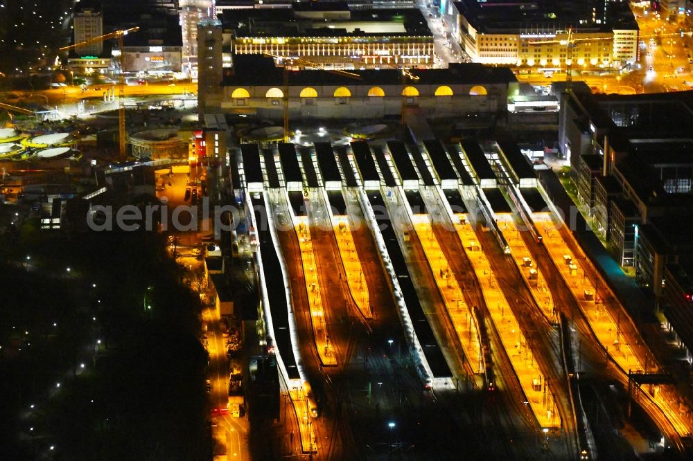 Aerial photograph at night Stuttgart - Night lighting building of the main station of the railway and construction site for the development project Stuttgart 21 in Stuttgart in the state of Baden-Wurttemberg