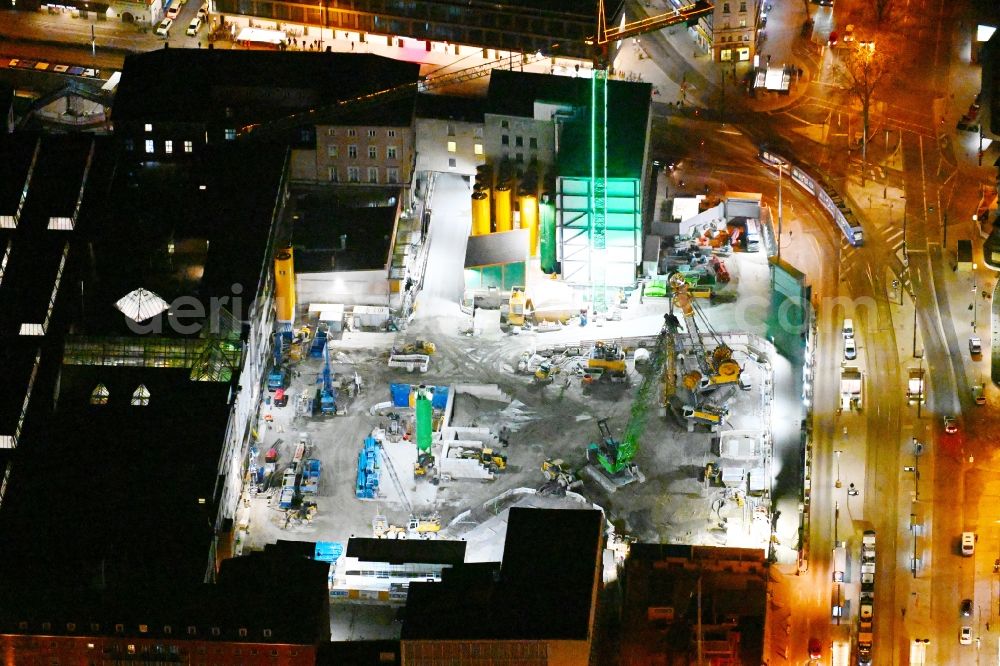 München at night from above - Night lighting construction work for the reconstruction of the station building of Central Stationes in the district Ludwigsvorstadt-Isarvorstadt in Munich in the state Bavaria, Germany