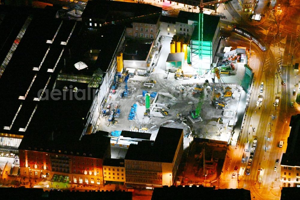 Aerial photograph at night München - Night lighting construction work for the reconstruction of the station building of Central Stationes in the district Ludwigsvorstadt-Isarvorstadt in Munich in the state Bavaria, Germany