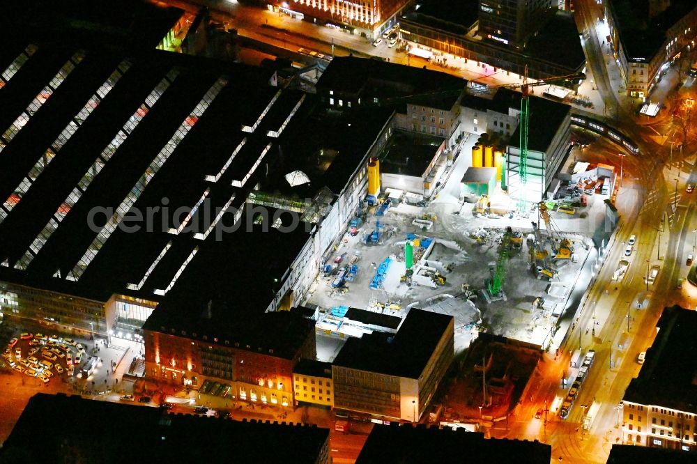 Aerial image at night München - Night lighting construction work for the reconstruction of the station building of Central Stationes in the district Ludwigsvorstadt-Isarvorstadt in Munich in the state Bavaria, Germany