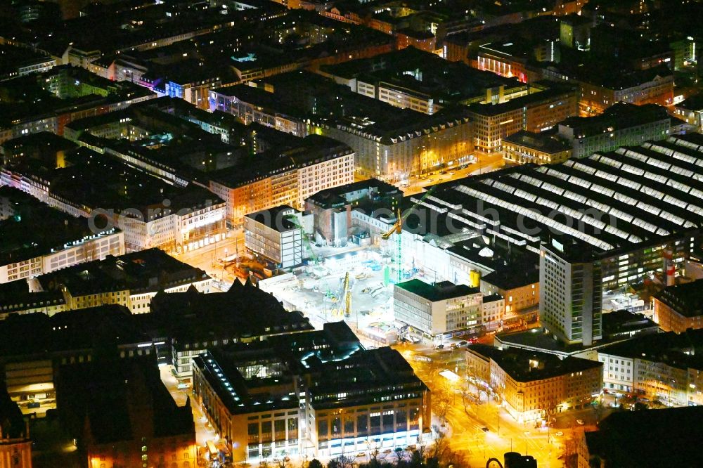 Aerial photograph at night München - Night lighting construction work for the reconstruction of the station building of Central Stationes in the district Ludwigsvorstadt-Isarvorstadt in Munich in the state Bavaria, Germany