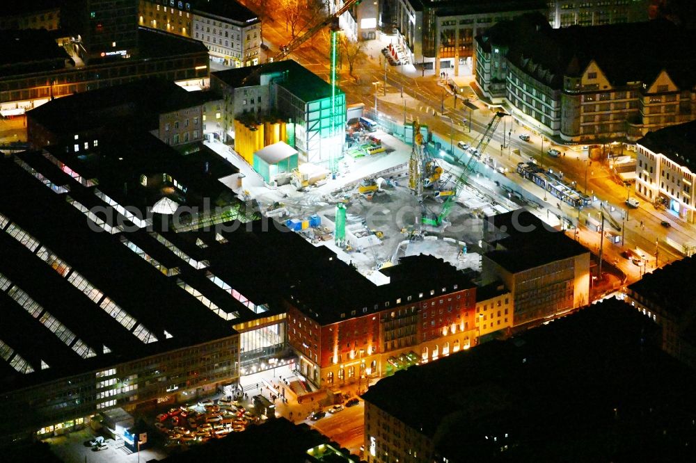 Aerial image at night München - Night lighting construction work for the reconstruction of the station building of Central Stationes in the district Ludwigsvorstadt-Isarvorstadt in Munich in the state Bavaria, Germany