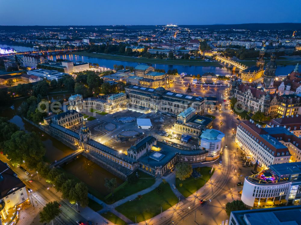 Dresden at night from the bird perspective: Night lighting construction site with reconstruction and renovation work at the palace of the castle Dresdner Zwinger at Theaterplatz - Sophienstrasse in the district Altstadt in Dresden in the state of Saxony, Germany