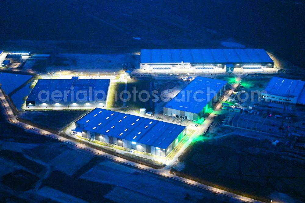 Aerial image at night Vehlefanz - Night lighting construction site to build a new building complex on the site of the logistics center Im Gewerbepark in the district Vehlefanz in Oberkraemer in the state Brandenburg, Germany