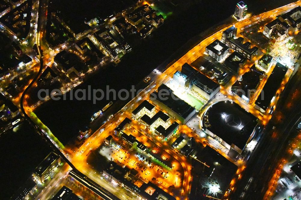 Berlin at night from above - Night lighting Construction site for the new building eines Kino- Freizeit- and Hotelkomplexes on Anschutz- Areal along of Muehlenstrasse in the district Bezirk Friedrichshain-Kreuzberg in Berlin, Germany