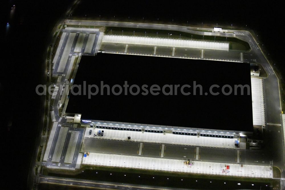 Aerial image at night Kiekebusch - Night lighting construction site for the construction of a logistics center of the Achim Walder retailer Amazon in Kiekebusch in the state of Brandenburg, Germany