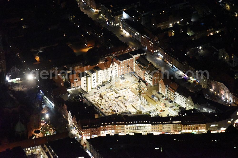 Aerial image at night Lübeck - Night view construction site to build a new multi-family residential complex Gruendungsviertel der Grundstuecksgesellschaft TRAVE mbH in Luebeck in the state Schleswig-Holstein