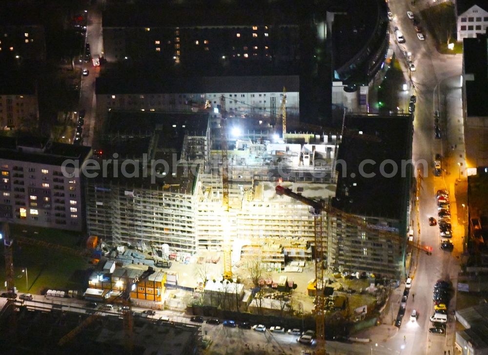 Aerial image at night Dresden - Night lighting Construction site to build a new multi-family residential complex Residenz on Postplatz of Consus Real Estate AG (ehemals CG Gruppe AG) on Annenstrasse in the district Altstadt in Dresden in the state Saxony, Germany