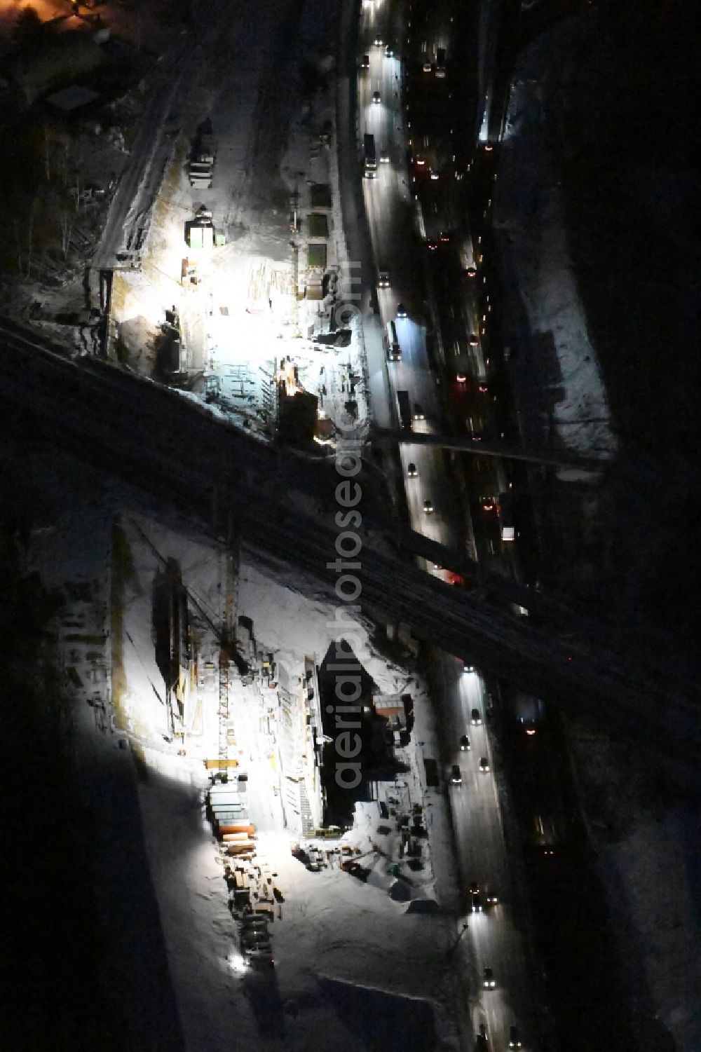 Michendorf at night from above - Night lighting Construction for the renovation of the railway bridge building to route the train tracks crossing course of motorway BAB A10 in Michendorf in the state Brandenburg