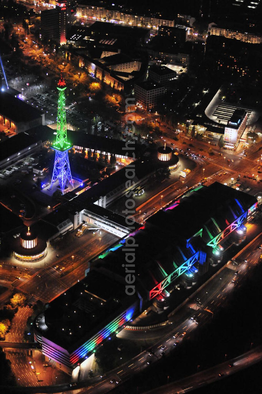 Aerial photograph at night Berlin - Nachtaufnahme: Sicht auf das beleuchtete Messegelände mit dem ICC Konfesscenter am Funkturm anlässlich des Festival Of Lights 2010 in Berlin. Nightshot: View to the illuminated exhibition ground with the Radio Tower Berlin in celebration of the Festival Of Lights 2010.