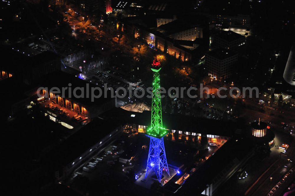 Aerial image at night Berlin - Nachtaufnahme: Sicht auf das beleuchtete Messegelände mit dem Funkturm anlässlich des Festival Of Lights 2010 in Berlin. Nightshot: View to the illuminated exhibition ground with the Radio Tower Berlin in celebration of the Festival Of Lights 2010.