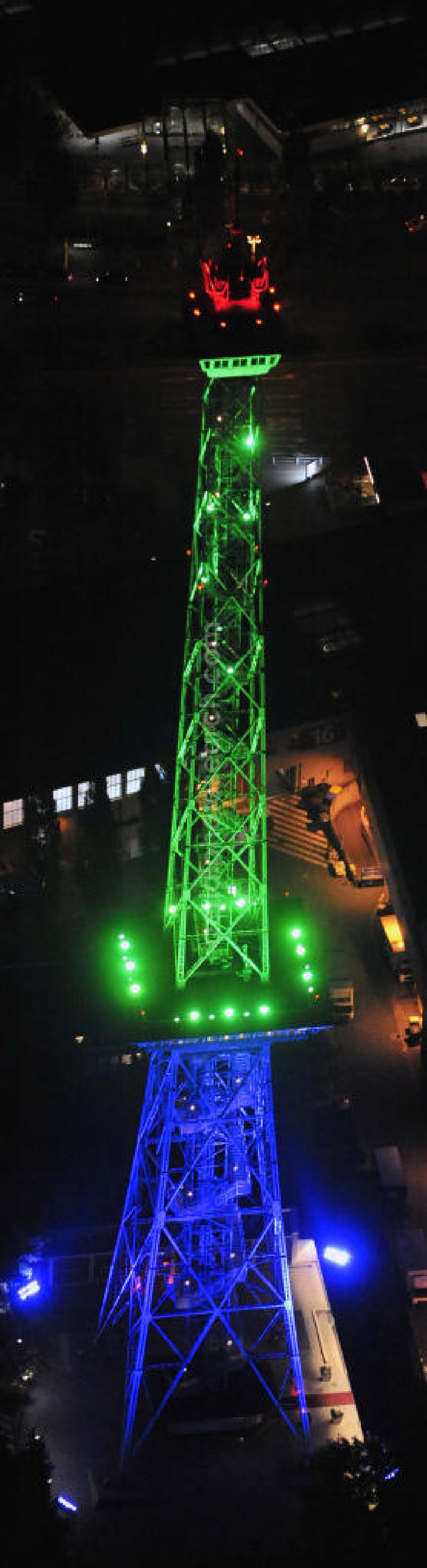 Aerial image at night Berlin - Nachtaufnahme: Sicht auf das beleuchtete Messegelände mit dem Funkturm anlässlich des Festival Of Lights 2010 in Berlin. Nightshot: View to the illuminated exhibition ground with the Radio Tower Berlin in celebration of the Festival Of Lights 2010.