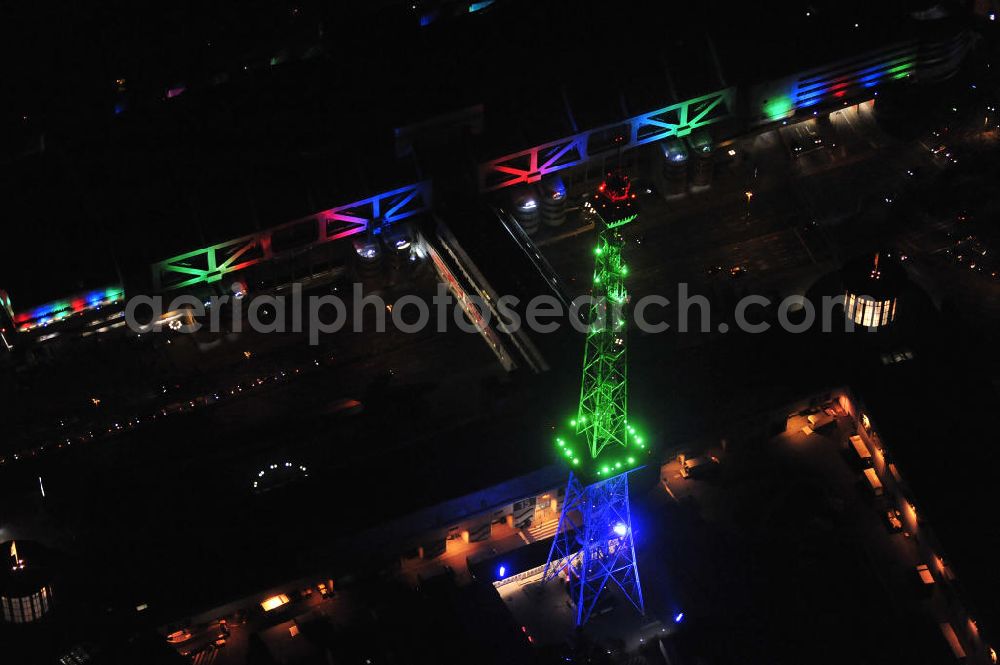 Aerial photograph at night Berlin - Nachtaufnahme: Sicht auf das beleuchtete Messegelände mit dem Funkturm anlässlich des Festival Of Lights 2010 in Berlin. Nightshot: View to the illuminated exhibition ground with the Radio Tower Berlin in celebration of the Festival Of Lights 2010.