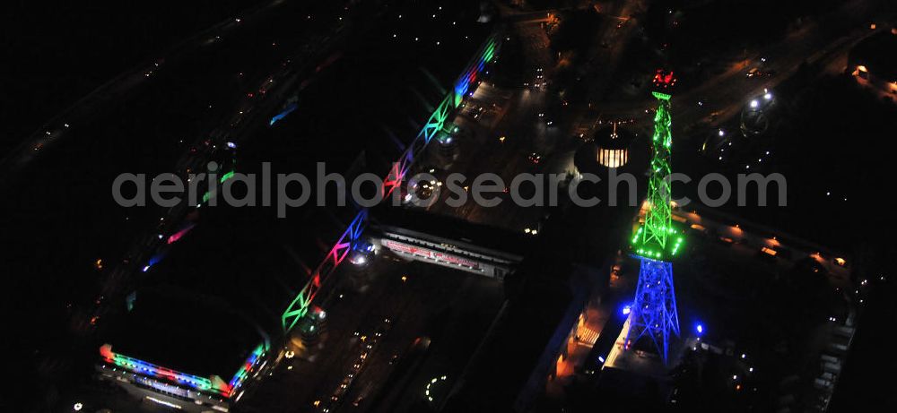 Aerial image at night Berlin - Nachtaufnahme: Sicht auf das beleuchtete Messegelände mit dem ICC Konfesscenter am Funkturm anlässlich des Festival Of Lights 2010 in Berlin. Nightshot: View to the illuminated exhibition ground with the Radio Tower Berlin in celebration of the Festival Of Lights 2010.