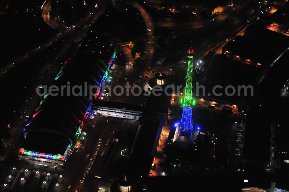 Berlin at night from above - Nachtaufnahme: Sicht auf das beleuchtete Messegelände mit dem ICC Konfesscenter am Funkturm anlässlich des Festival Of Lights 2010 in Berlin. Nightshot: View to the illuminated exhibition ground with the Radio Tower Berlin in celebration of the Festival Of Lights 2010.