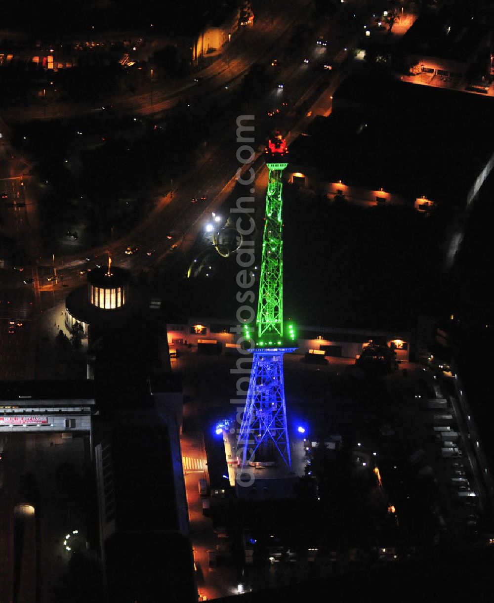 Aerial image at night Berlin - Nachtaufnahme: Sicht auf das beleuchtete Messegelände mit dem Funkturm anlässlich des Festival Of Lights 2010 in Berlin. Nightshot: View to the illuminated exhibition ground with the Radio Tower Berlin in celebration of the Festival Of Lights 2010.