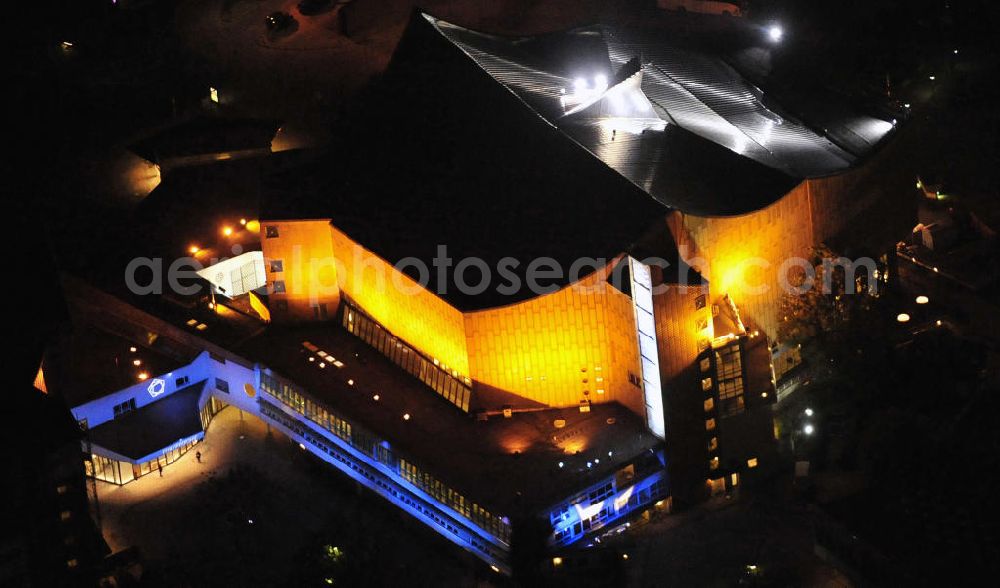 Aerial photograph at night Berlin - Nachtaufnahme: Sicht auf die beleuchtete Philharmonie am Potsdamer Platz anlässlich des Festival Of Lights 2010 in Berlin. Nightshot: View to the illuminated philharmonic hall in the city centre of Berlin in celebration of the Festival Of Lights 2010.