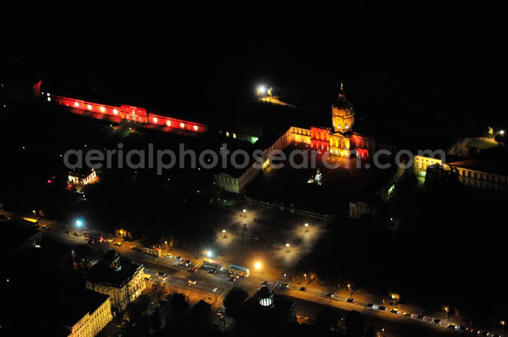 Aerial photograph at night Berlin - Nachtluftbild vom Schloß Charlottenburg am Spandauer Damm anläßlich des Festival of Lights in der Berliner Innenstadt. Hunderttausende Besucher strömten am letzten Wochenende des Festivals zu den illuminierten Gebäuden und angestrahlten Bereichen der Innenstadt. Night shot of the castle Charlottenburg during the festival of light in Berlins inner-city.