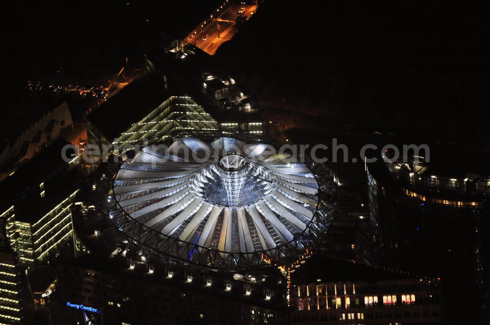 Berlin at night from the bird perspective: Nachtaufnahme: Sicht auf das Kaufhaus Sony Center am Potsdamer Platz anlässlich des Festival Of Lights 2010 in Berlin. Nightshot: View to the department store Sony Center at the Potsdamer Platz in celebration of the Festival Of Lights 2010 in Berlin.