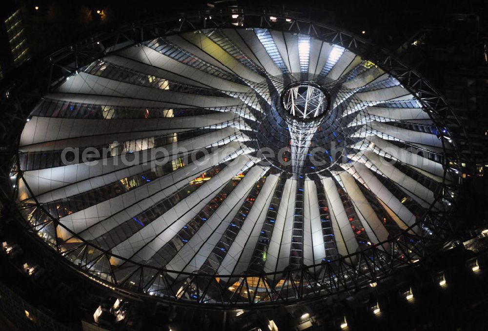 Berlin at night from the bird perspective: Nachtaufnahme: Sicht auf das Kaufhaus Sony Center am Potsdamer Platz anlässlich des Festival Of Lights 2010 in Berlin. Nightshot: View to the department store Sony Center at the Potsdamer Platz in celebration of the Festival Of Lights 2010 in Berlin.