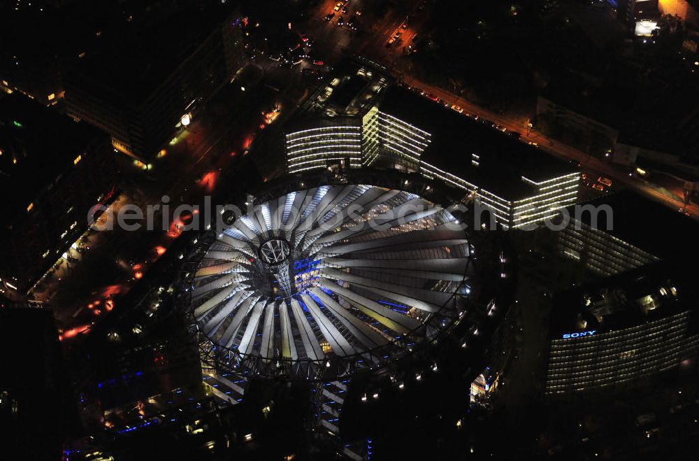 Berlin at night from the bird perspective: Nachtaufnahme: Sicht auf das Kaufhaus Sony Center am Potsdamer Platz anlässlich des Festival Of Lights 2010 in Berlin. Nightshot: View to the department store Sony Center at the Potsdamer Platz in celebration of the Festival Of Lights 2010 in Berlin.