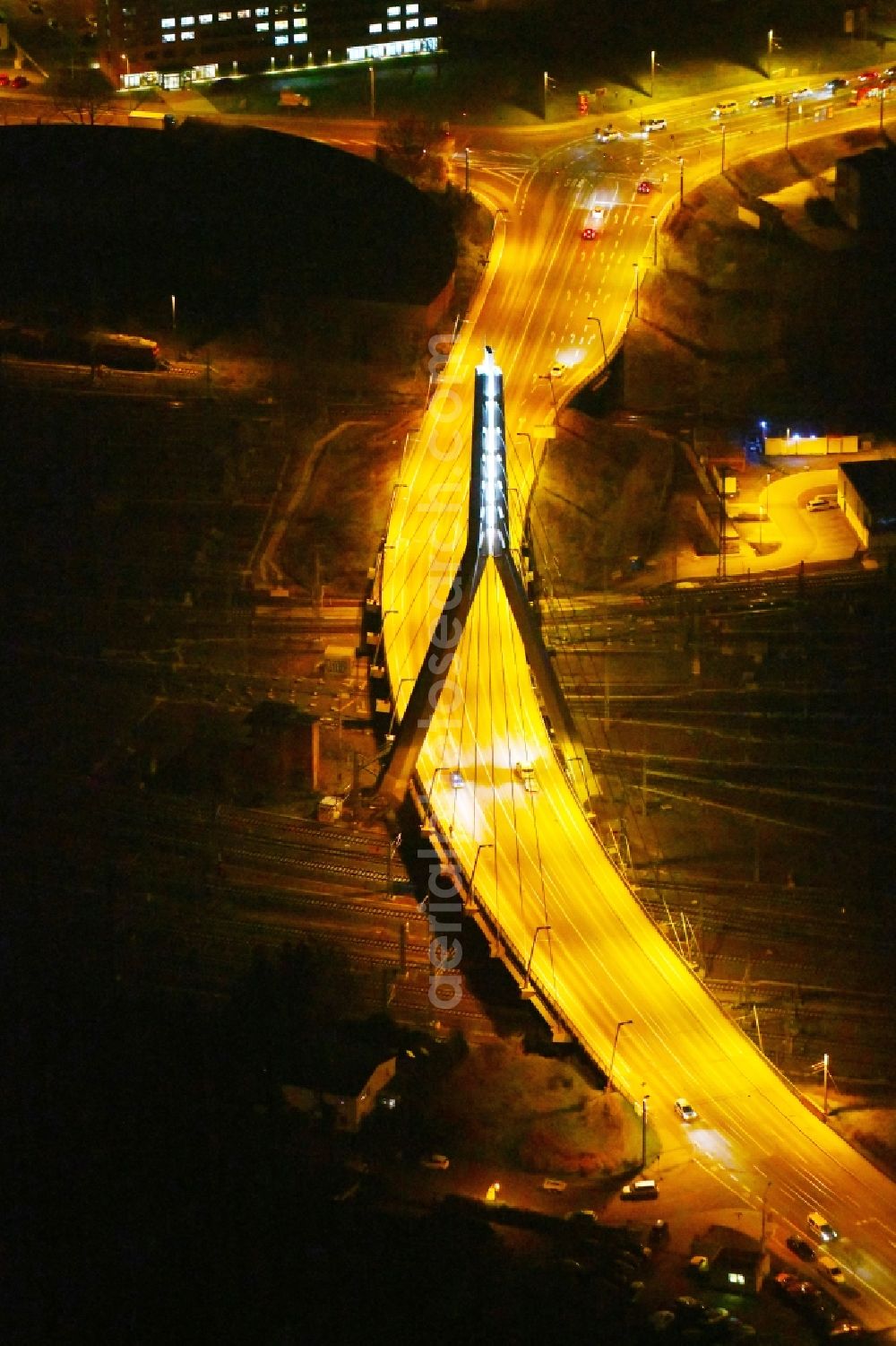 Halle (Saale) at night from above - Night lighting View of Berlin Bridge in Halle (Saale) in Saxony-Anhalt