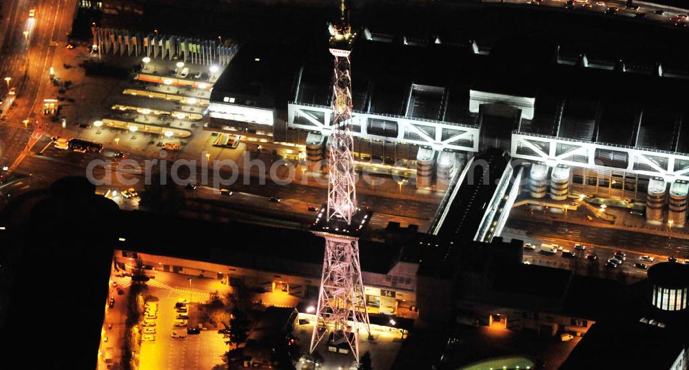 Berlin at night from the bird perspective: Nachtaufnahme: Der Berliner Funkturm in Charlottenburg. Night Shot: Radio tower in Berlin.