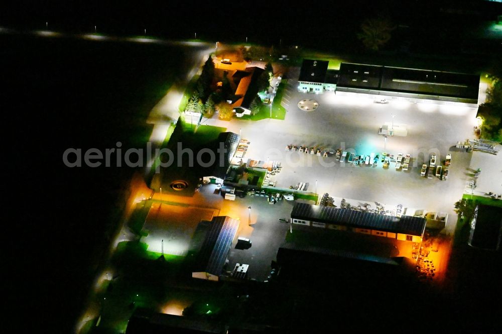 Aerial photograph at night Güsten - Night lighting site of the depot of the on Neue Anlage in Guesten in the state Saxony-Anhalt, Germany