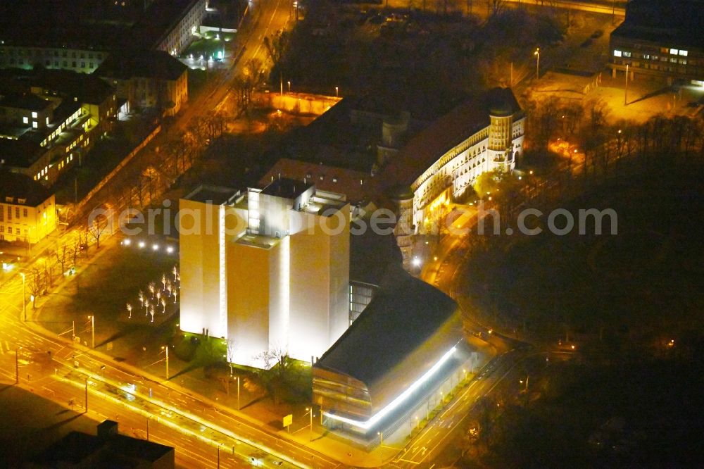 Leipzig at night from the bird perspective: Night lighting Library Building of Deutsche Nationalbibliothek Deutsches Buch- and Schriftmuseum Deutsche Nationalbibliothek on ensemble Deutscher Platz in the district Zentrum-Suedost in Leipzig in the state Saxony