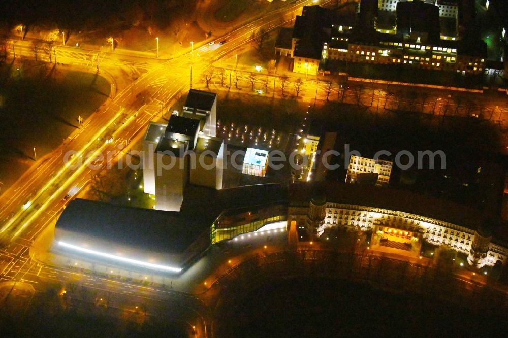 Leipzig at night from the bird perspective: Night lighting Library Building of Deutsche Nationalbibliothek Deutsches Buch- and Schriftmuseum Deutsche Nationalbibliothek on ensemble Deutscher Platz in the district Zentrum-Suedost in Leipzig in the state Saxony