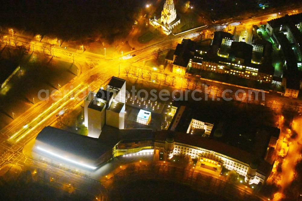 Aerial photograph at night Leipzig - Night lighting Library Building of Deutsche Nationalbibliothek Deutsches Buch- and Schriftmuseum Deutsche Nationalbibliothek on ensemble Deutscher Platz in the district Zentrum-Suedost in Leipzig in the state Saxony