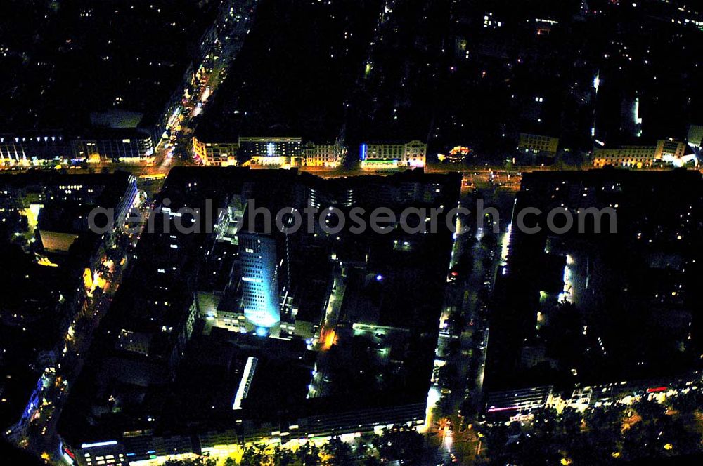 Berlin at night from the bird perspective: Blick auf den Kurfürstendamm mit dem Kudamm-Carree in Berlin-Charlottenburg bei Nacht.