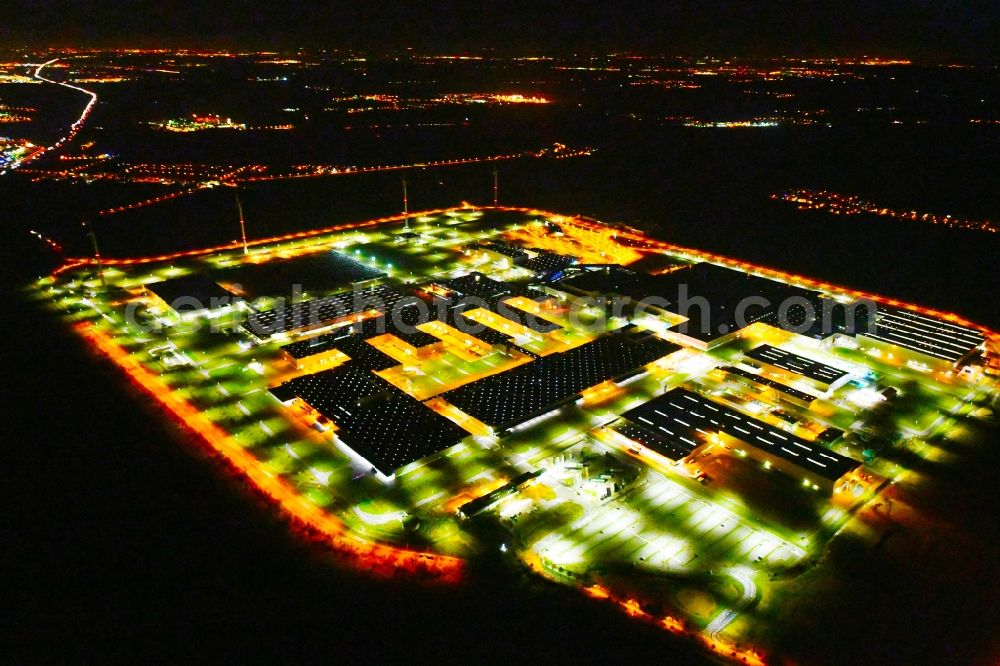 Aerial image at night Leipzig - Night lighting site location of Bayerische Motoren Werke AG BMW Leipzig in Saxony