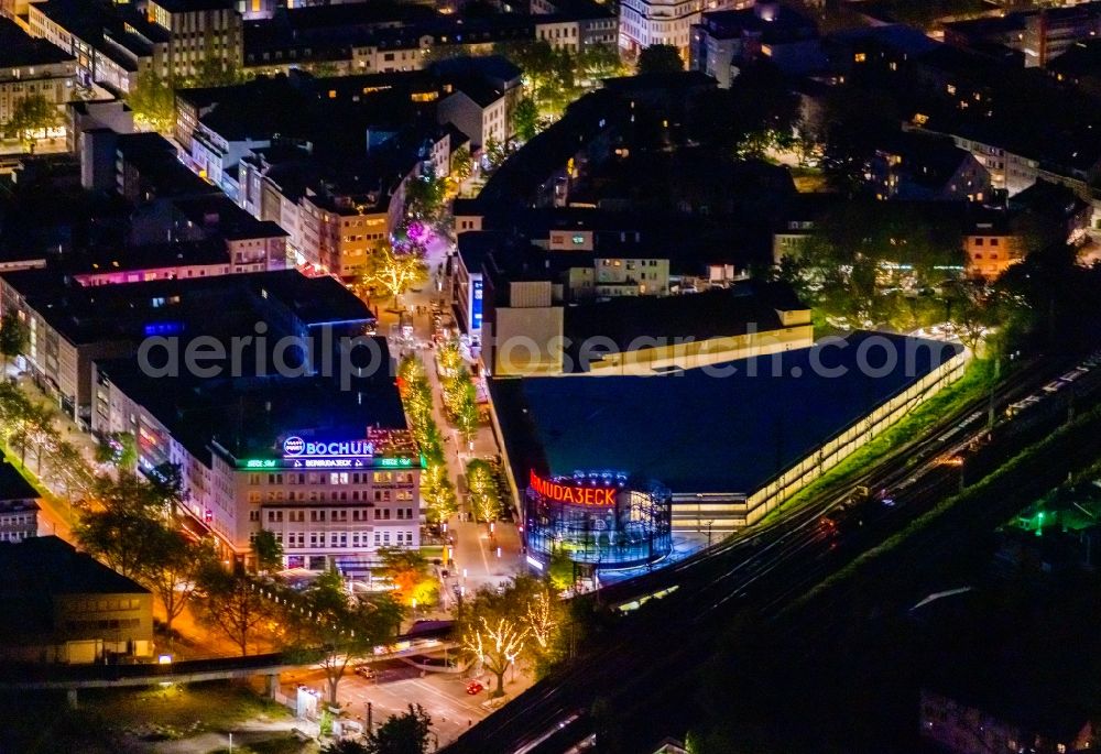 Bochum at night from the bird perspective: Night lighting the grounds of the Bermuda Triangle in Bochum's entertainment district with restaurants and clubs overlooking the central station in the inner city in Bochum in North Rhine-Westphalia