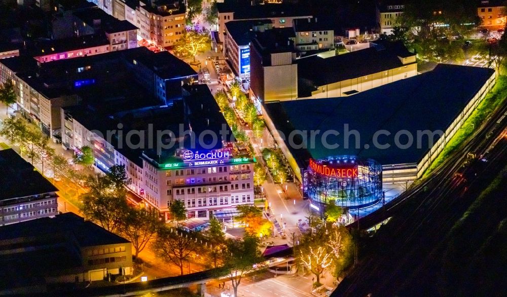 Aerial image at night Bochum - Night lighting the grounds of the Bermuda Triangle in Bochum's entertainment district with restaurants and clubs overlooking the central station in the inner city in Bochum in North Rhine-Westphalia