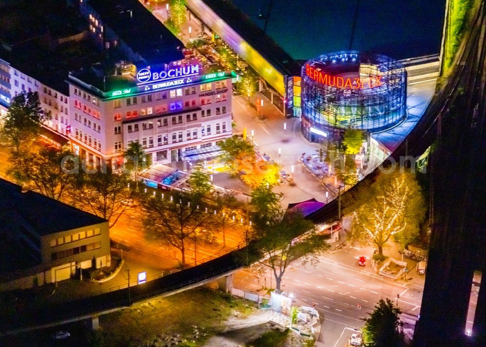 Bochum at night from the bird perspective: Night lighting the grounds of the Bermuda Triangle in Bochum's entertainment district with restaurants and clubs overlooking the central station in the inner city in Bochum in North Rhine-Westphalia