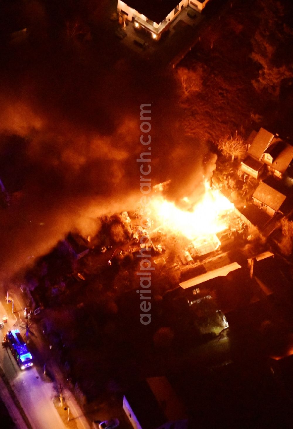 Aerial image at night Stahnsdorf - Night lighting fire- Ruins One family house in a residential area Sputendorfer Strasse - Enzianweg in Stahnsdorf in the state Brandenburg, Germany