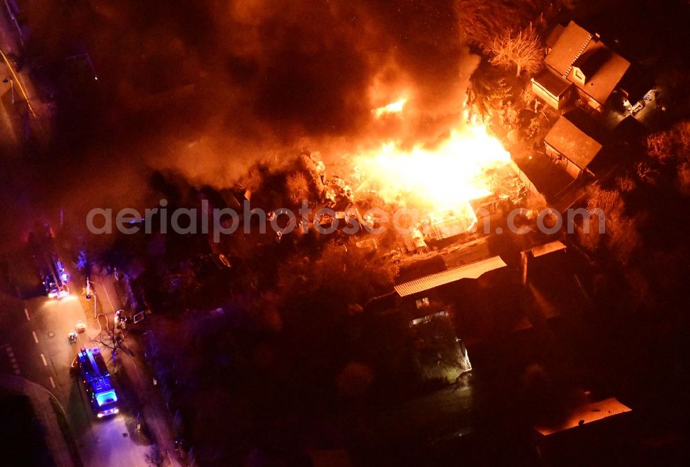 Stahnsdorf at night from above - Night lighting fire- Ruins One family house in a residential area Sputendorfer Strasse - Enzianweg in Stahnsdorf in the state Brandenburg, Germany