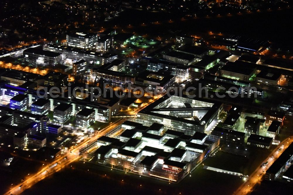 Unterföhring at night from above - Night Aerial view Office building - Ensemble Allianz Germany AG on the Diesel street in Munich Unterfoehring in Bavaria