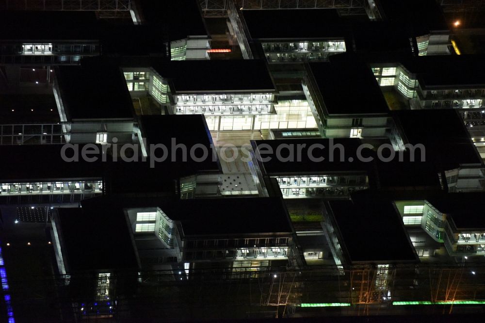 Aerial photograph at night Unterföhring - Night Aerial view Office building - Ensemble Allianz Germany AG on the Diesel street in Munich Unterfoehring in Bavaria