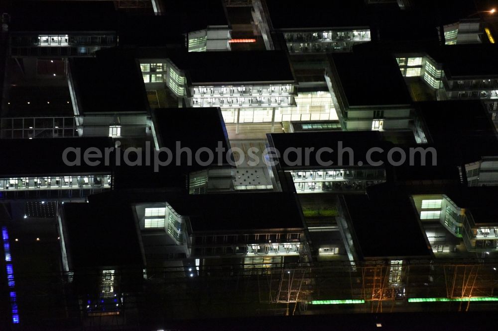 Unterföhring at night from above - Night Aerial view Office building - Ensemble Allianz Germany AG on the Diesel street in Munich Unterfoehring in Bavaria