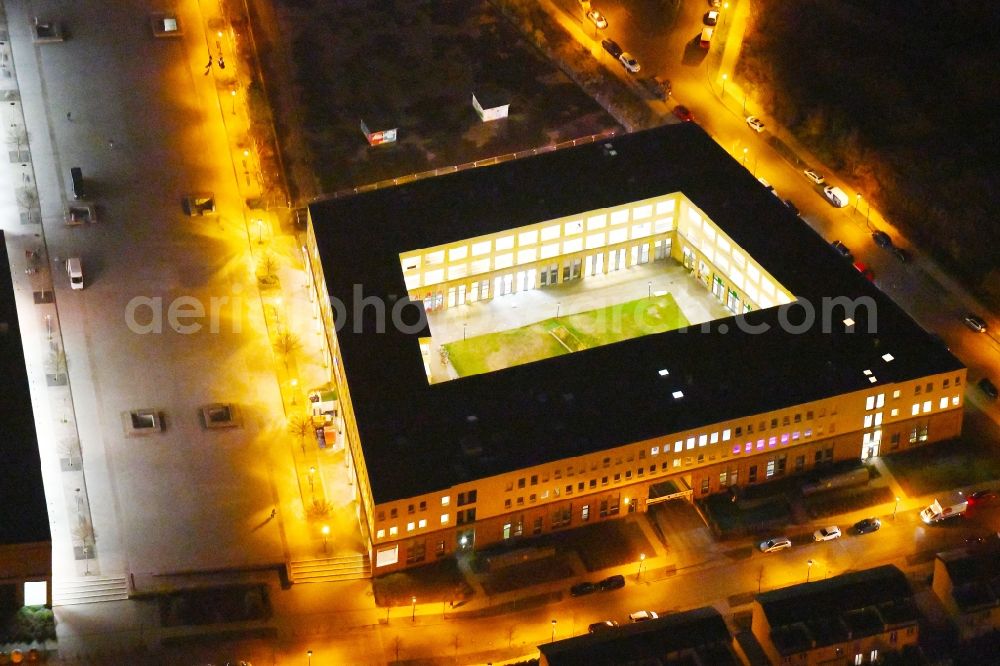 Berlin at night from above - Night lighting Office building - Ensemble on Elsterwerdaer Platz in the district Biesdorf in Berlin, Germany